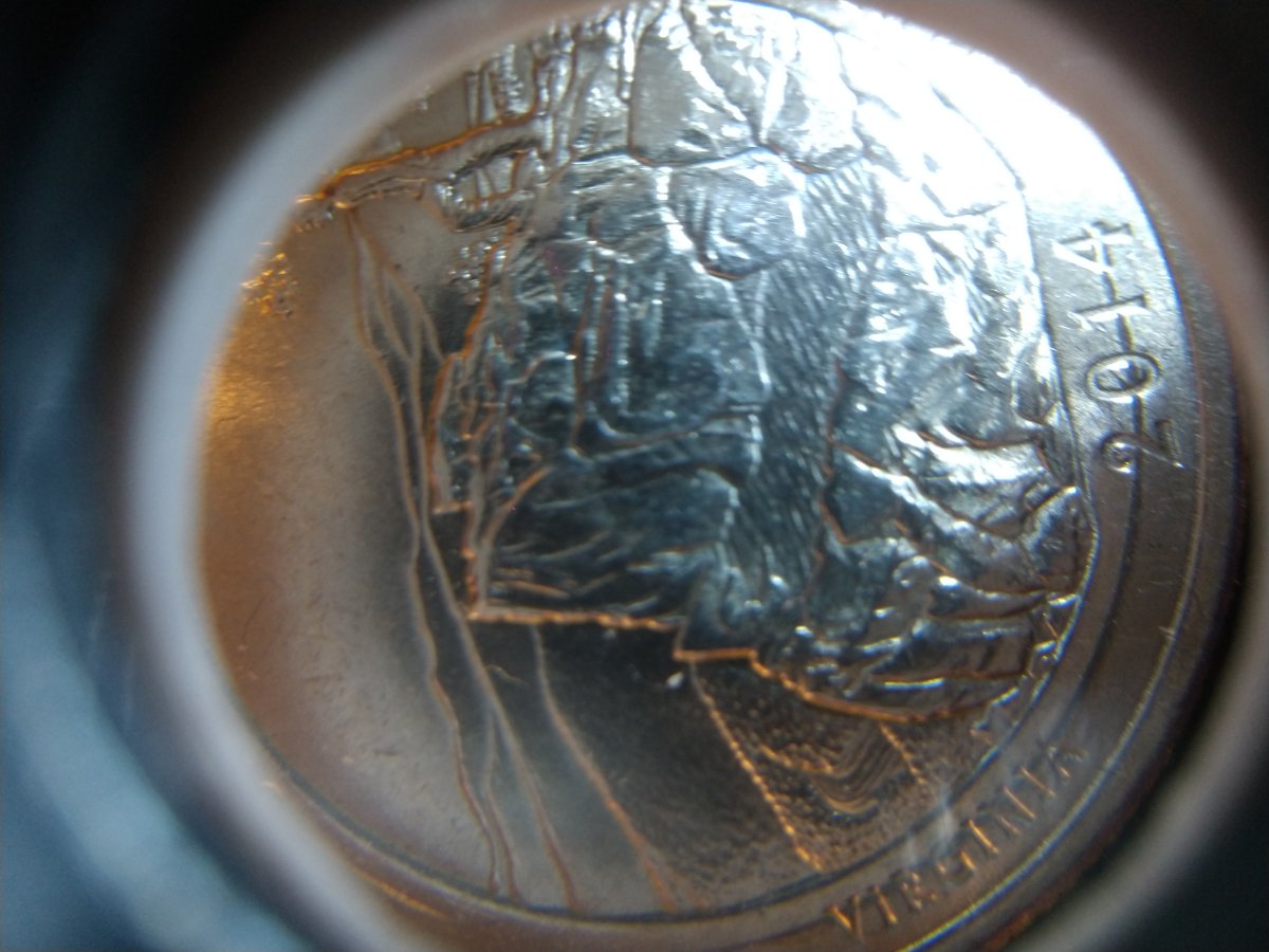 2014-Quarter-With-Lines-Or-Scratches-Under-Letters-And-Date