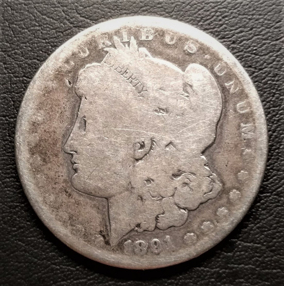 1886-O-And-1891-O-Morgan-Dollar