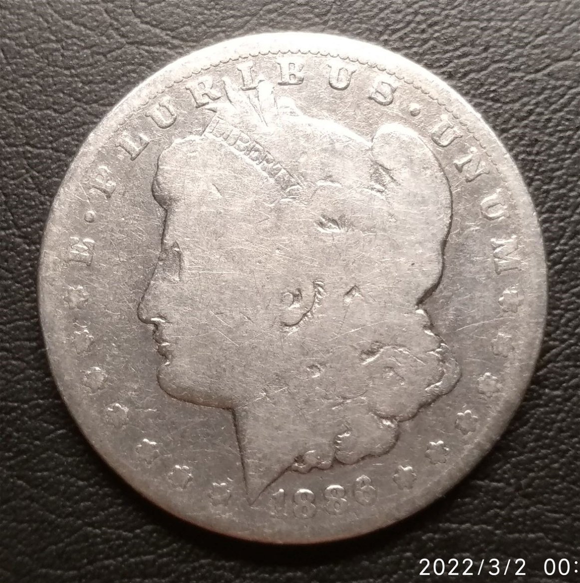 1886-O-And-1891-O-Morgan-Dollar