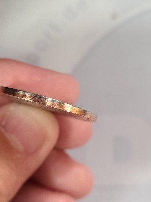 Whats-The-Story-With-This-Quarter?-Even-Edges-And-A-Weird-Outline.