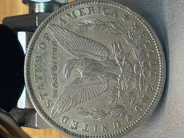1897-O-One-Dollar-Silver-Coin-To-Grading