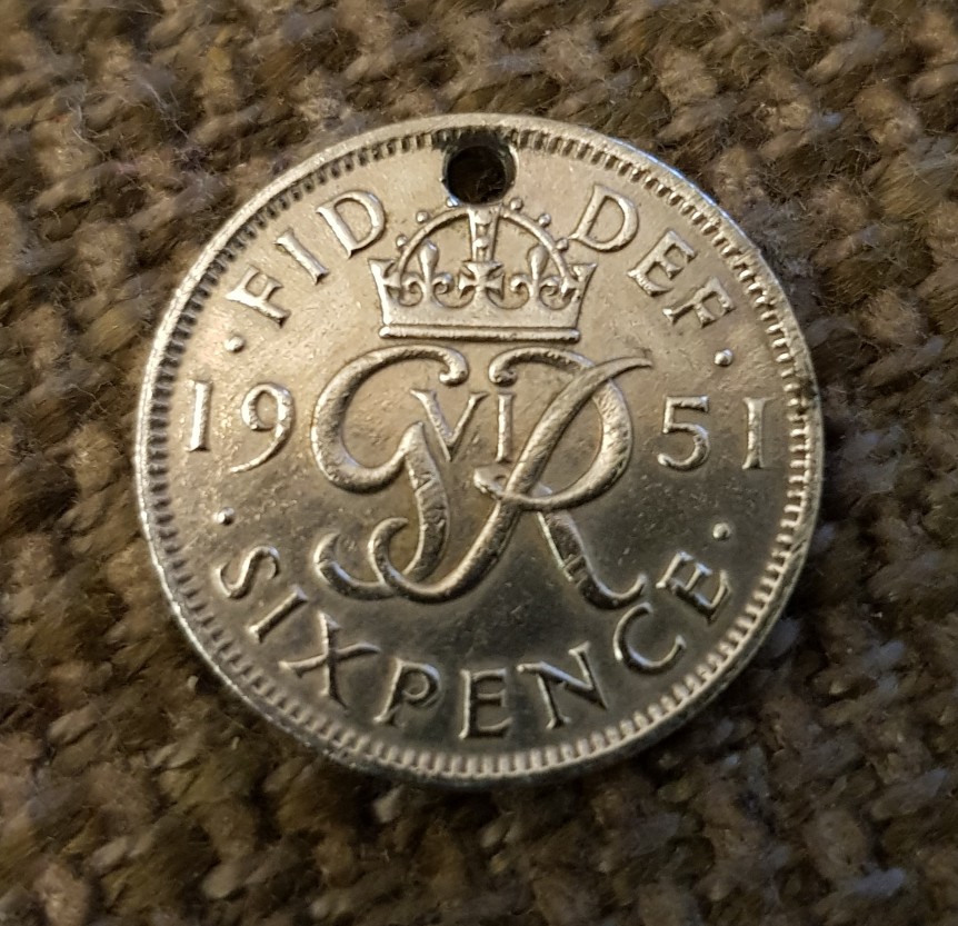 Sixpence-Coin-With-A-Hole-In-It