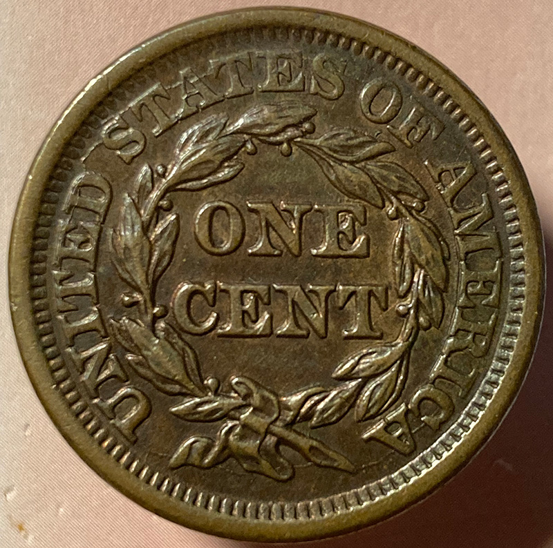 1849-Braided-Hair-Cent---In-Hand