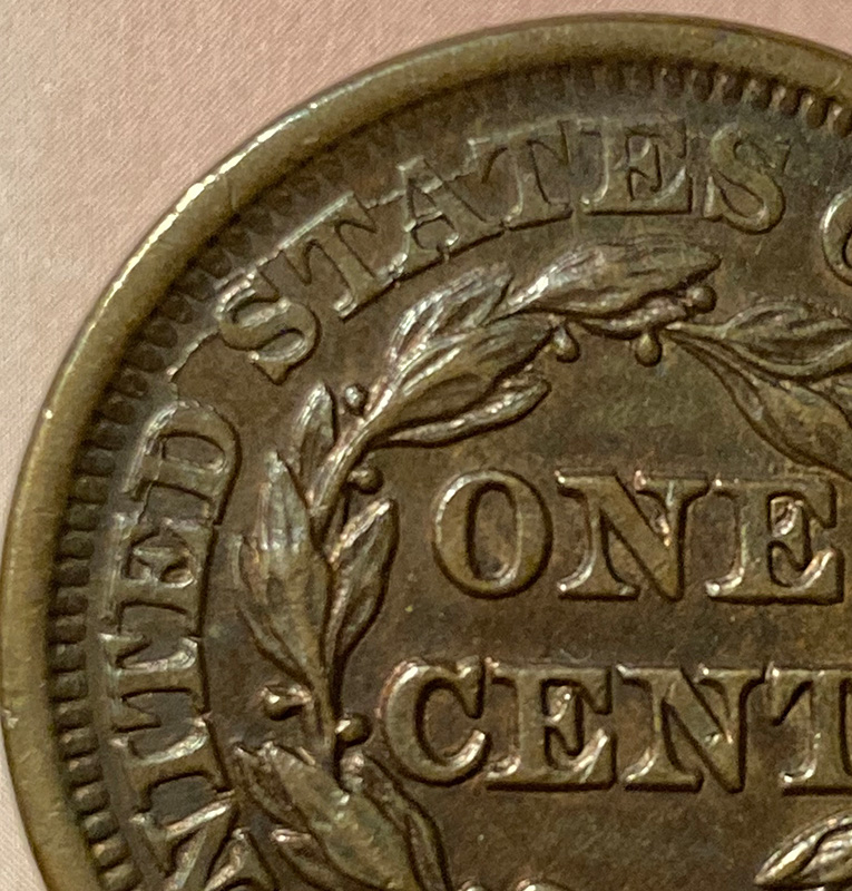 1849-Braided-Hair-Cent---In-Hand