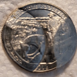 2016-State-Quarter-Stamped-With-Another-Coin