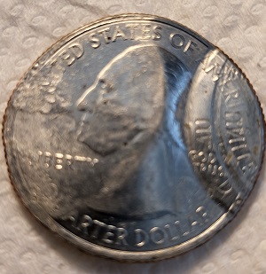 2016-State-Quarter-Stamped-With-Another-Coin
