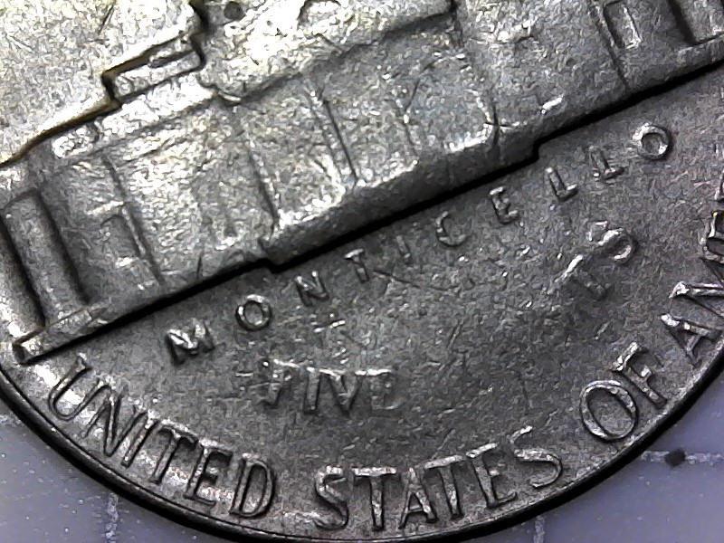 1965-Jefferson-Nickel-With-Floating-Head-And-Reverse-Missing-Letters