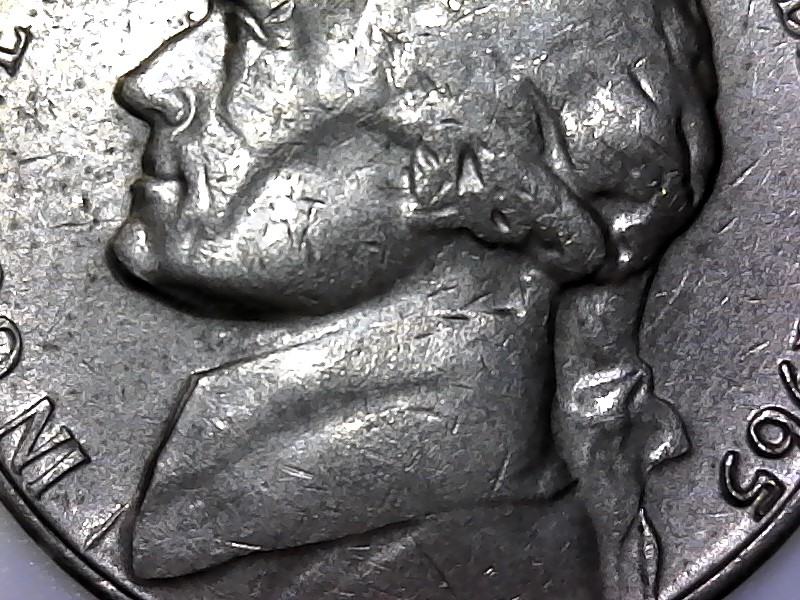1965-Jefferson-Nickel-With-Floating-Head-And-Reverse-Missing-Letters