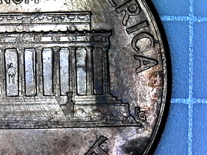 1995-D-Cent-With-Two-Raise-Areas-On-Lower-Jacket-And-Upside-Down-