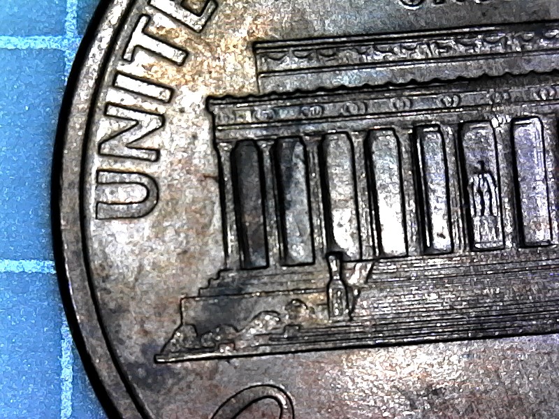 1995-D-Cent-With-Two-Raise-Areas-On-Lower-Jacket-And-Upside-Down-