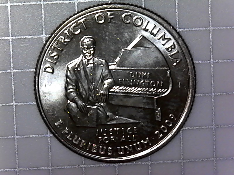 2009-D-Quarter-With-Metal-Flakes-On-L-And-I-In-Ellington
