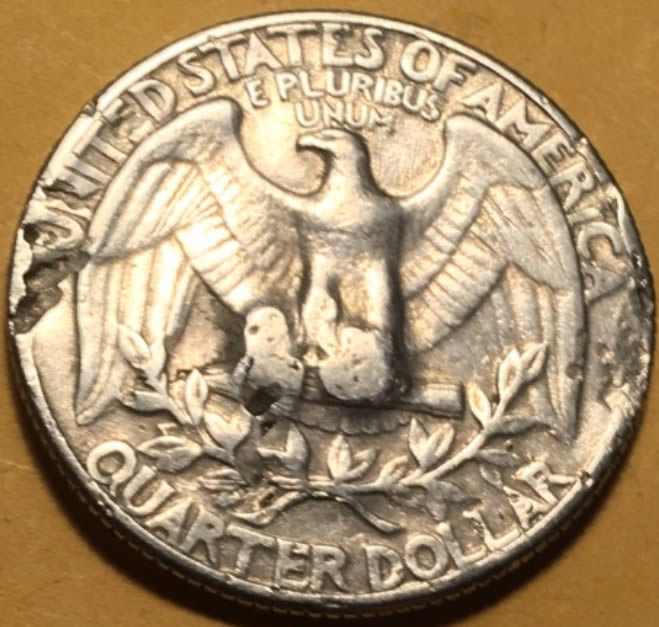 1965-Quarter,-Mint-Or-Human-Error?