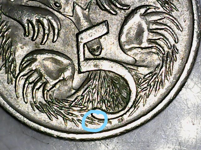 2011-5c-Gap-In-Spine-Under-The-5