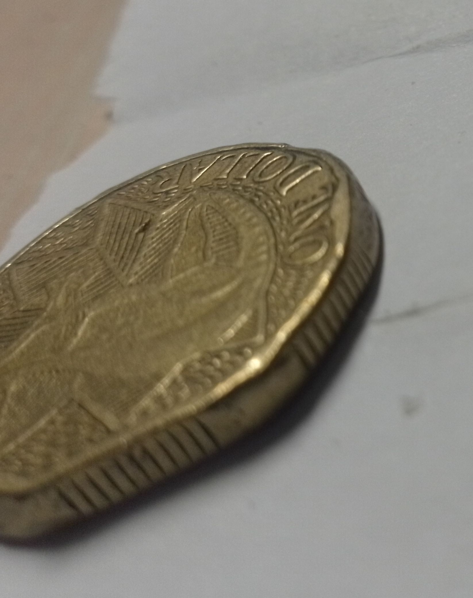 1988-$1-Coin-With-Angled-Edges-On-One-Side