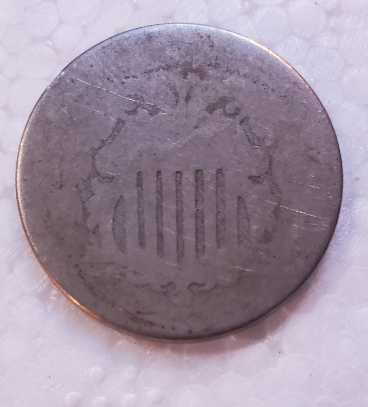 Is-There-Anything-Safe-That-Can-Be-Used-To-Bring-Out-Date-On-Worn-Coins?