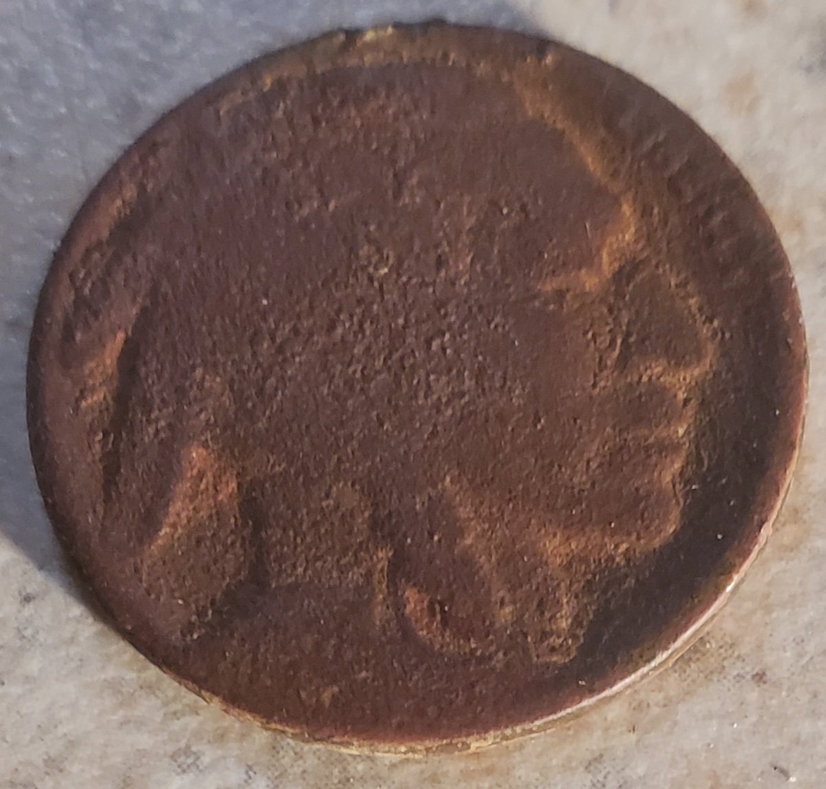 Is-There-Anything-Safe-That-Can-Be-Used-To-Bring-Out-Date-On-Worn-Coins?