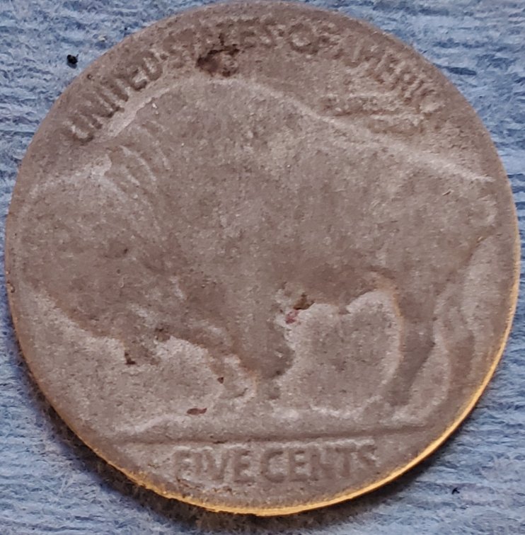 Is-There-Anything-Safe-That-Can-Be-Used-To-Bring-Out-Date-On-Worn-Coins?