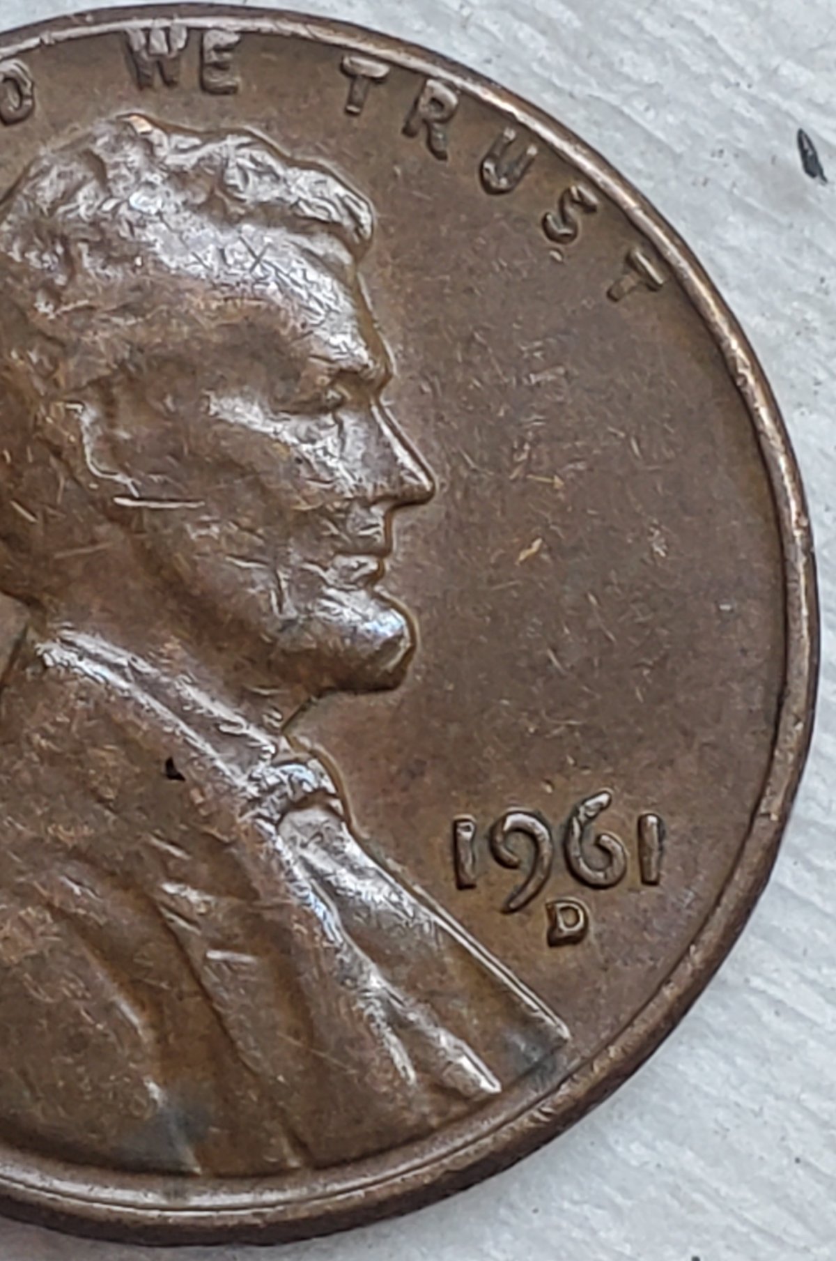 1961-D-Lincoln-Memorial-Cent,-Extra-Strip-Running-Down-East-Side-Of-Bust?