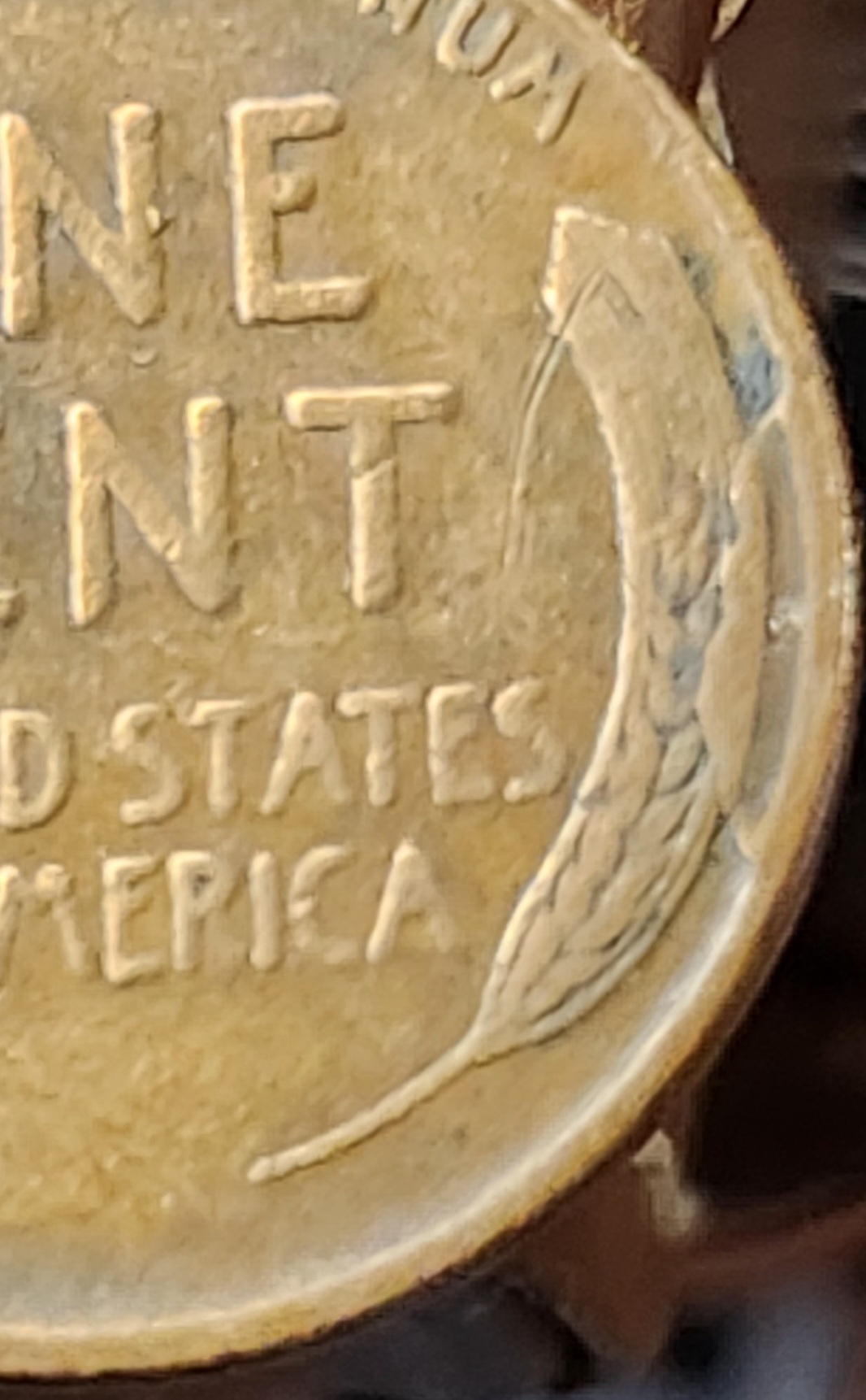What's-The-Numismatic-Term-For-What's-Happening-On-The-Right-Wheat-Stalk-On-This-1936-P-LWC?