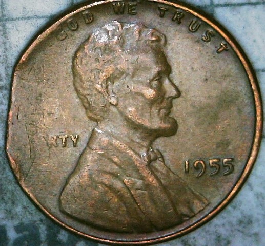 1955-P-Cent-With-A-Straight-Clip-And-Struck-On-A-Tapered-Blank