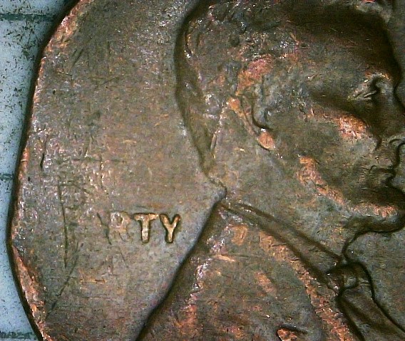 1955-P-Cent-With-A-Straight-Clip-And-Struck-On-A-Tapered-Blank