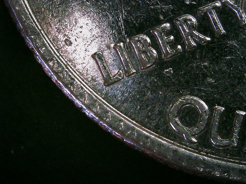 2006-D-Quarter---Odd-Error-Or-Garage-Job?