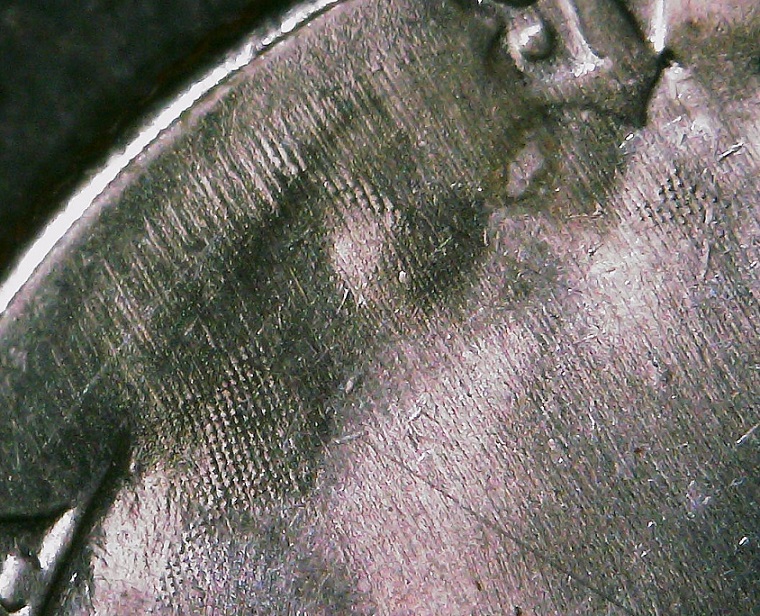 1987-D-Quarter-With-Crazy-Strike-Through