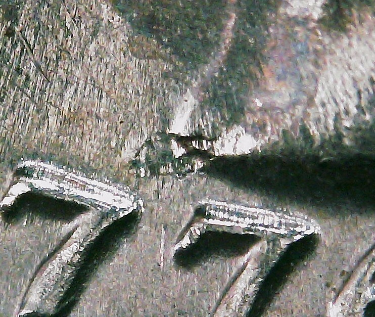 1976-D-Quarter-Struck-Through-Thread/Fiber?