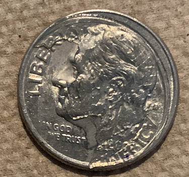 What-Is-Going-On-With-This-2002-Dime-I-Found?