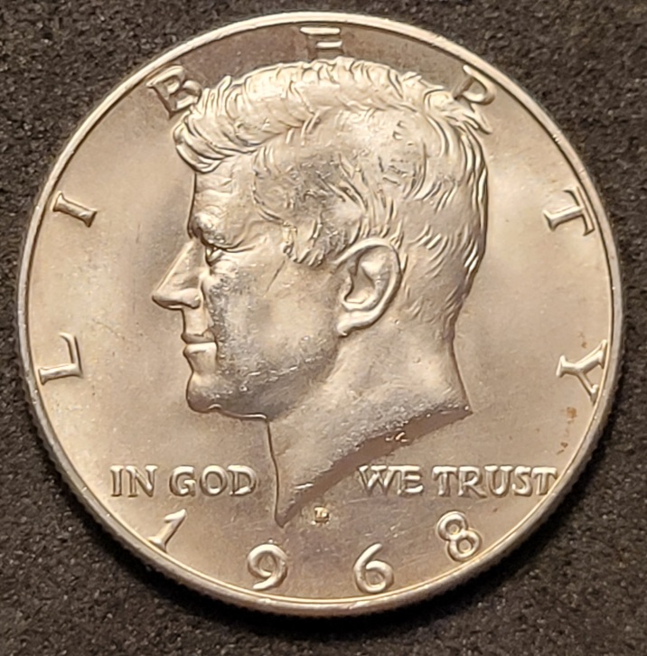 1968-D-Kennedy-Half-Dollar-With-MD-And-Something-Else.