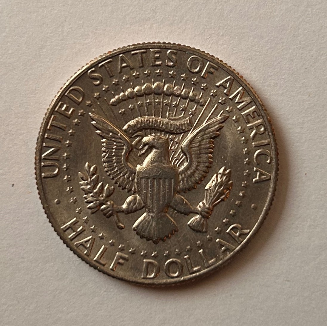 1982-P-Mint-Kennedy-Half-Dollar.-Part-Of-E-Missing-In-Liberty.