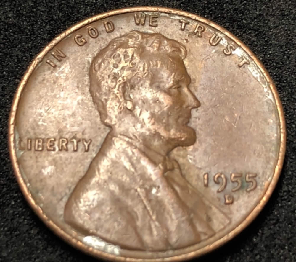 1955-D-Wheat-Penny.-Silver-On-Obverse-Along-The-Rim.