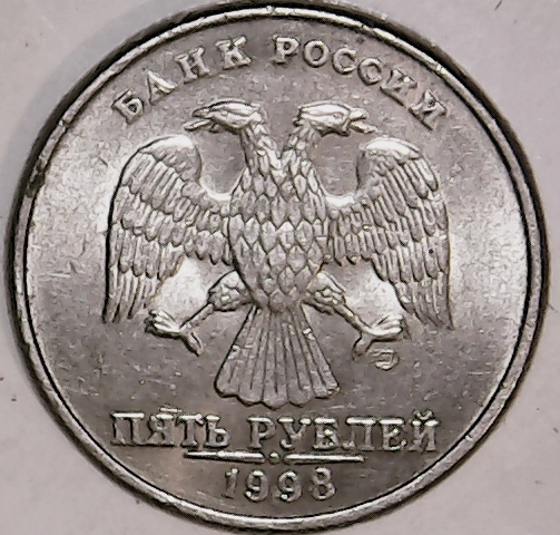 Pretty-Cool-Foreign-Coin-In-My-My-Quarter-Roll---What-Is-It?
