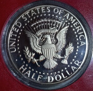 1979-S-Half-Dollar,-Type-1,-Struck-Through-Metal-Shaving-Error-On-Cheek-And-Railroad-Rim-Value