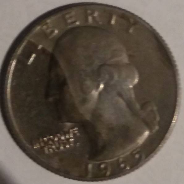 1965-Quarter-Strange-Line-In-The-Metal