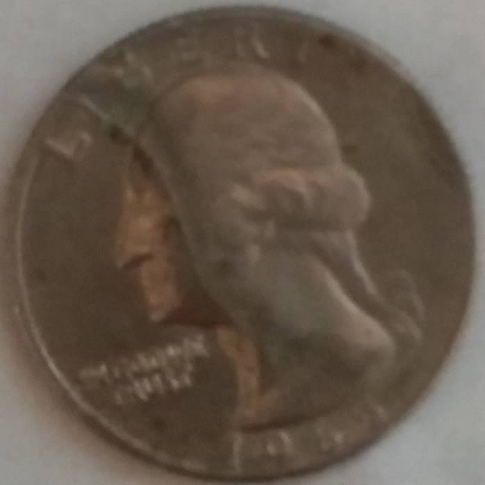 1965-Quarter-Strange-Line-In-The-Metal
