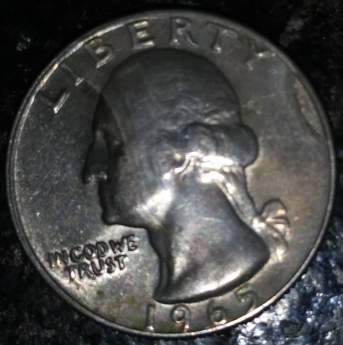 1965-Quarter-Strange-Line-In-The-Metal