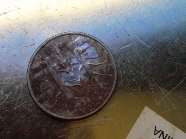 Strange-Quarter-Can't-Tell-If-It-Is-Damaged--Its-�-Vermont-1791-2001-D