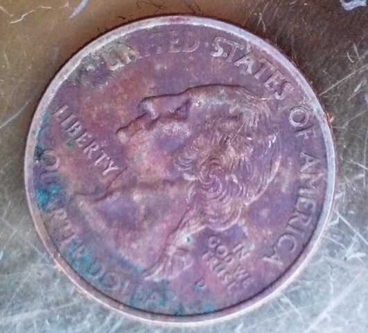 Strange-Quarter-Can't-Tell-If-It-Is-Damaged--Its-�-Vermont-1791-2001-D