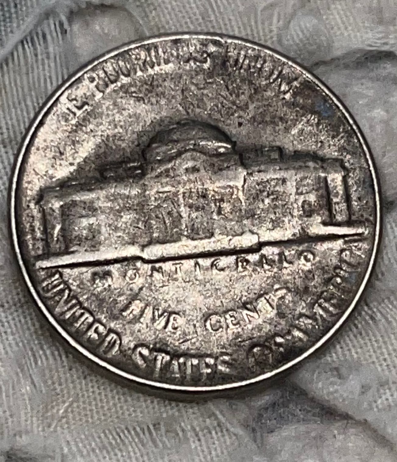 1955-Jefferson-Nickel-Error?