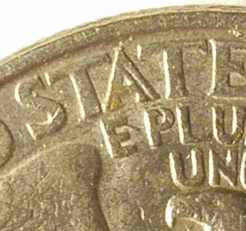 Strange-Symbol-On-This-1894-S-Morgan-And-Washington-Quarter