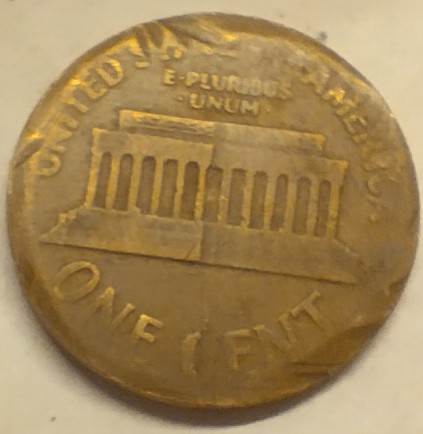 1959?-Penny-Not-Sure-If-Error,-Clipped-Or-Just-Damaged.
