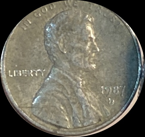 1987-D-Lincoln-Cent.-Unclad-And-Wedge-Shape-Side-View