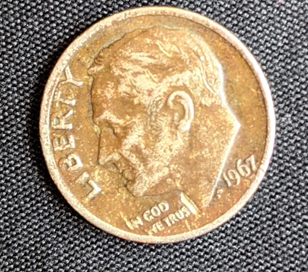 1967-Dime,-Is-This-Damaged-Or-A-Mint-Error?