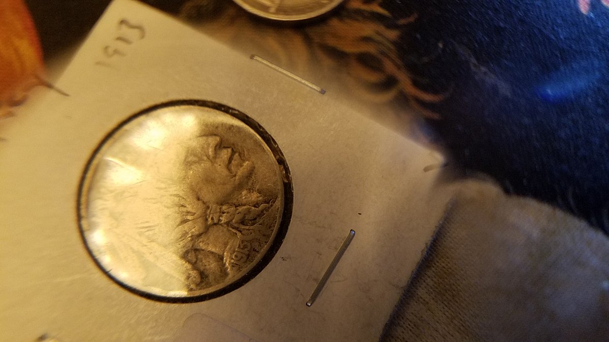 1913-Buffallo-Nickel-Stamped-On-Another-Coin