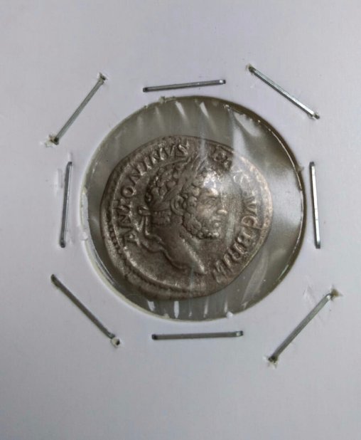 Can-You-Do-Something-About-A-Scrash-On-A-Silver-Coin?