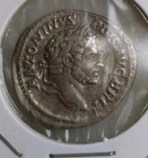 Can-You-Do-Something-About-A-Scrash-On-A-Silver-Coin?