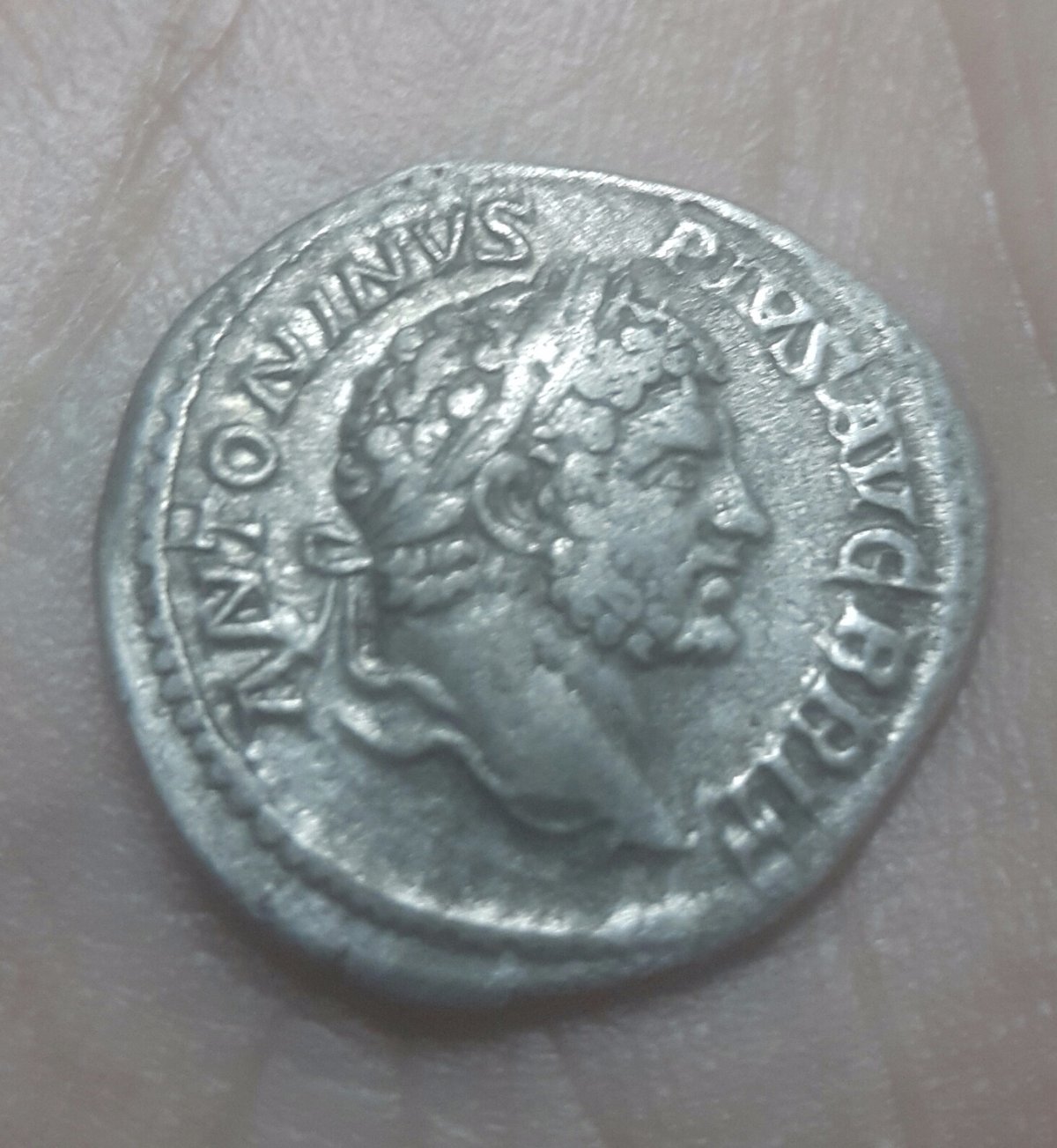 Can-You-Do-Something-About-A-Scrash-On-A-Silver-Coin?