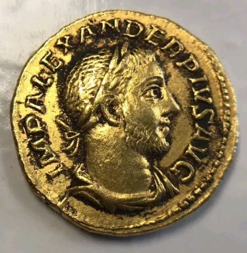 Black-Spots-On-A-Gold-Coin-Coin?