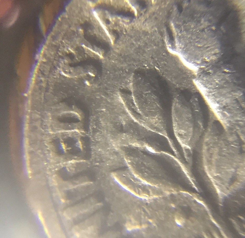 1987-Dime-D-Has--Abnormal-Face-And-Circle-On-Neck.-Number-6-And-Letter-S-In